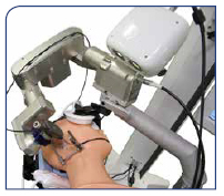 surgical robot which is able to only drill a small hole in the skull behind the ear
